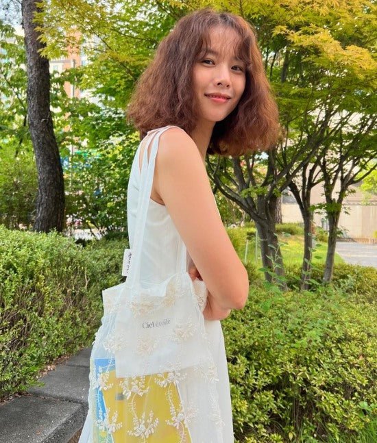 Actress Jo Yoon-hee stuns fans with a fresh curly bob hairstyle amid new beginnings following her split from Lee Dong-gun. - OUR K-POP